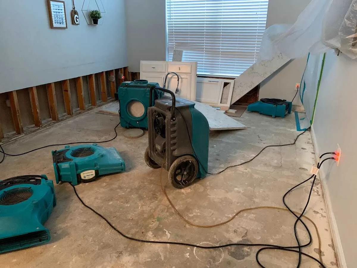 Dehumidifier in flood-cut room for Water Damage Restoration in Paw Paw